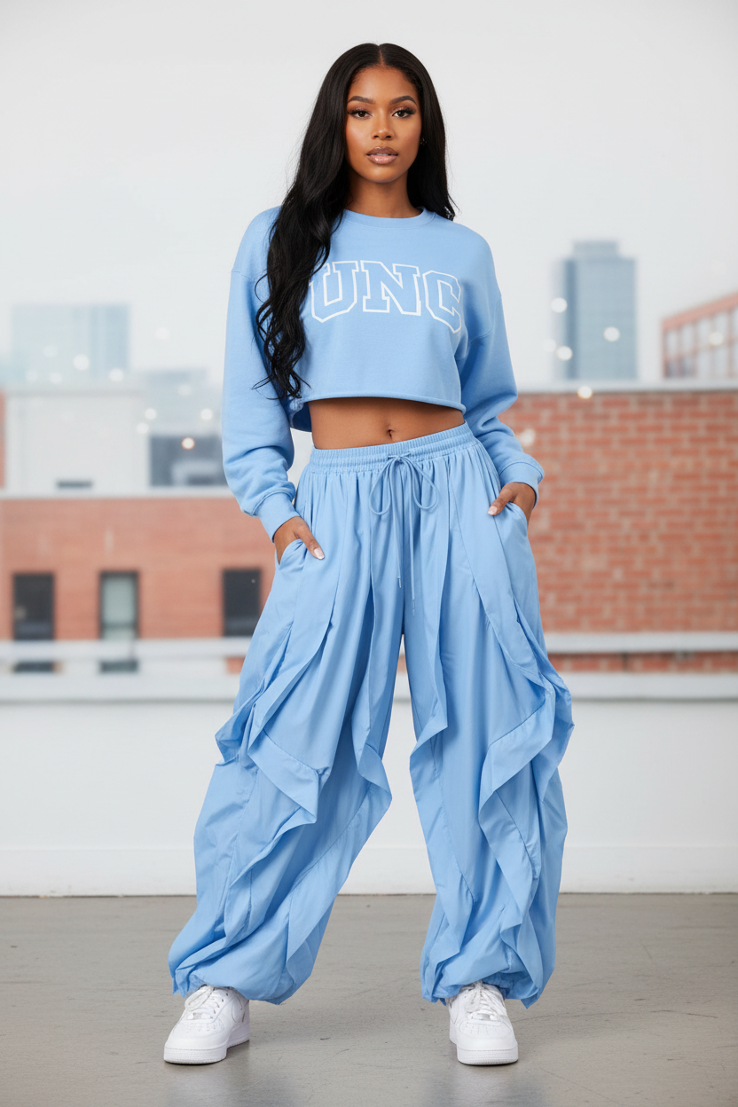 Light Blue Wavy Oversized Pants styled with NC sweatshirt and sneakers