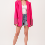 Model wearing hot pink embellished blazer - front view